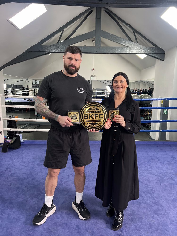 Marnie Merrilees with Mick Terrill, then BKFC Heavyweight World Champion